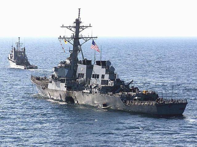 USS Cole DDG 67 towed by the USNS Catawba