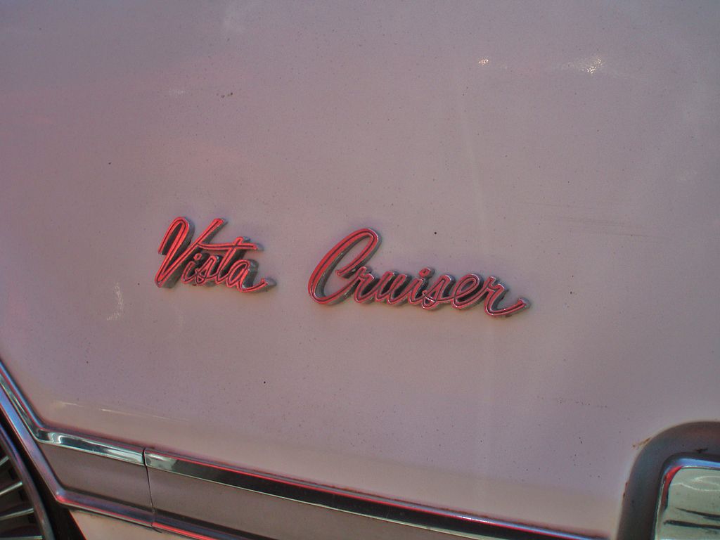 A 1966 Oldsmobile Vista Cruiser front guard badges