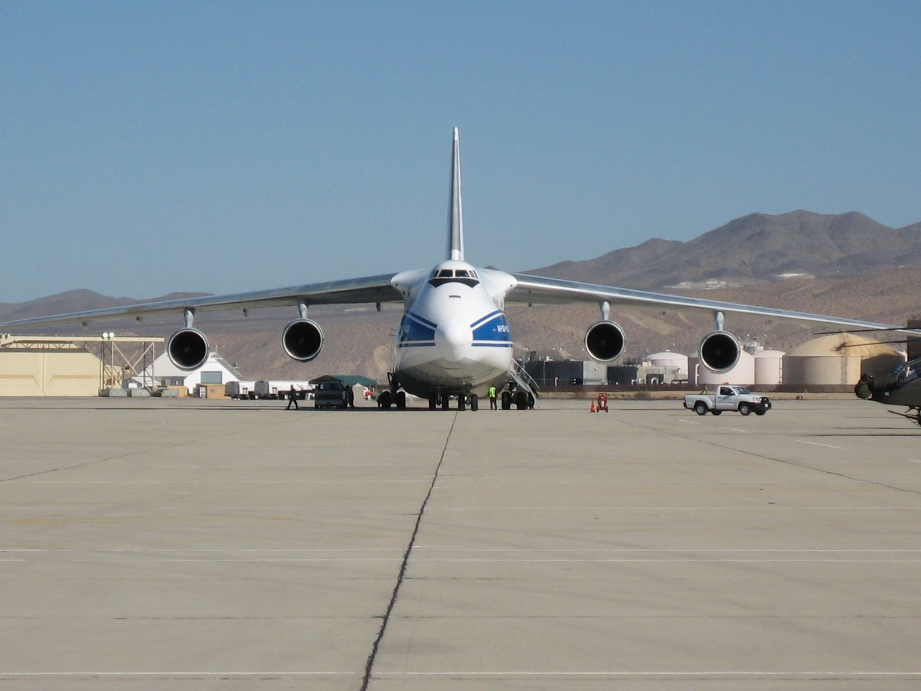 An Antonov An-124 (Volga-Dnepr) unloading Apache attack helicopters at Victorville Airport.